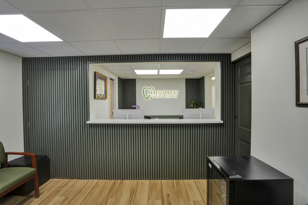 Modern reception area at Main Street Dental Center with clean design and welcoming front desk