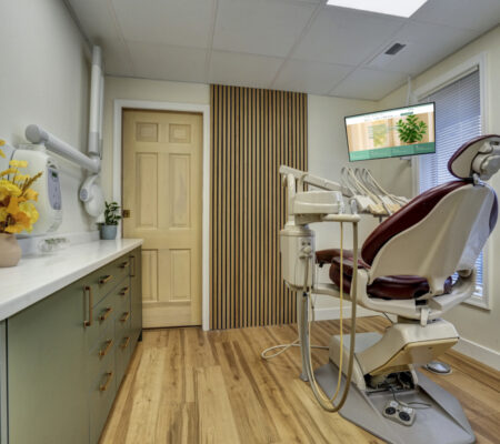 Comfortable dental chair and modern equipment at Main Street Dental Center treatment room