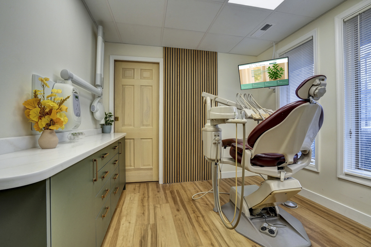 Comfortable dental chair and modern equipment at Main Street Dental Center treatment room