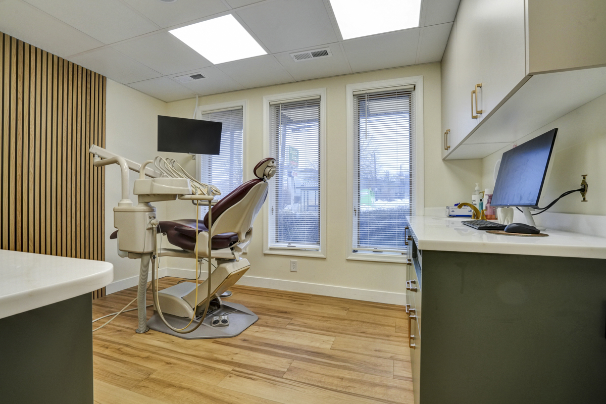 Modern dental treatment room at Main Street Dental Center with advanced equipment and comfortable patient chair